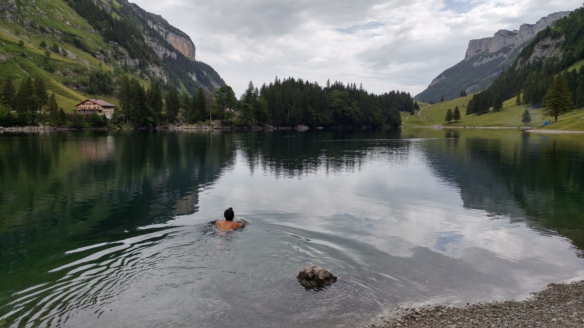 Even on a gray day, you should pack a swimsuit to jump into the pristine, clear water at Seealpsee. You'll earn it after the steep hike up! #Takeahike