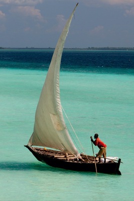 After weeks travelling across souther Africa a few days rest in Zanzibar, sandy beach cool drink and watching tge local fishermen