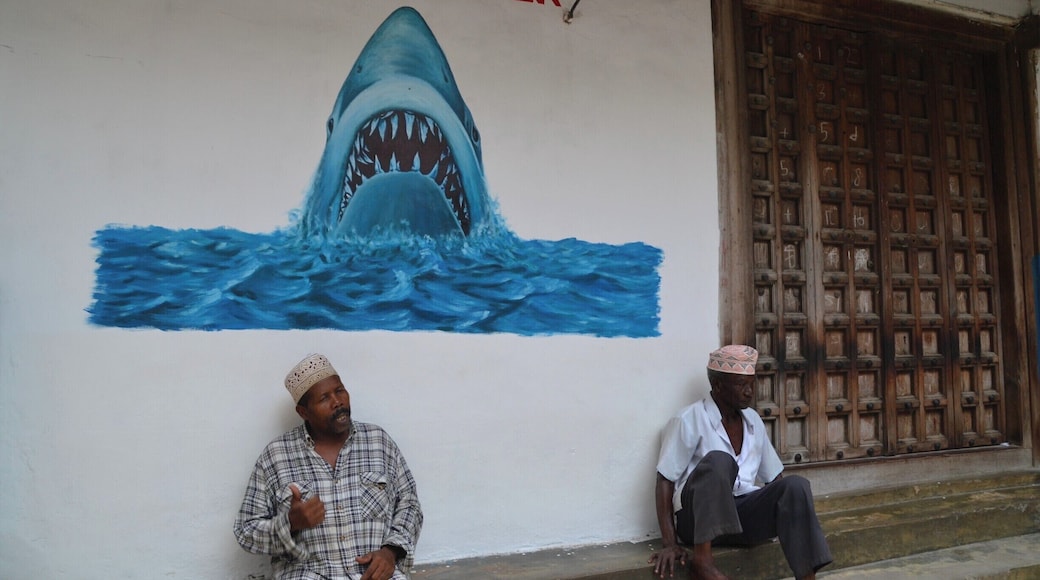 Jaws corner is a place where the locals gather to discuss politics and other things or just drink a cup of coffee. This corner is located somewhere in the maze like streets of Stone Town, on Zanzibar. It is a pleasure getting lost in all the tiny alleys while talking to some locals and looking at all the amazing doors and buildings.
#zanzibar #tanzania #streetart