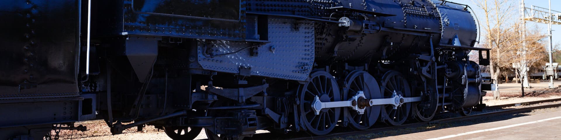 Close view of an old steam iron big locomotive on the station in Arizona, USA