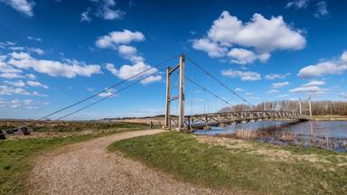 Kong Hans suspension bridge in Skjern meadows Ringkoebing, Denmark