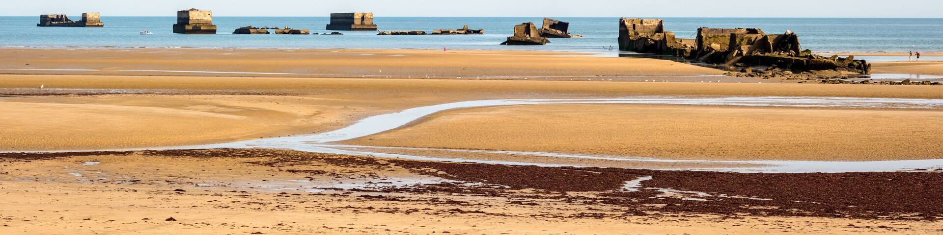Panoramic view of the remains of Phoenix caissons in Asnelles, France, used to build the artificial Mulberry harbour on Gold Beach after the Normandy landings in World War II.