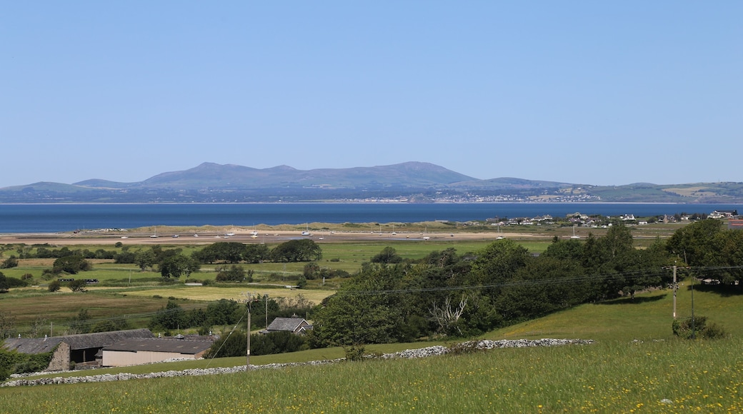 A view across farmland towards the Llyn Peninsula and Cardigan Bay from Llanbedr, Wales, UK.