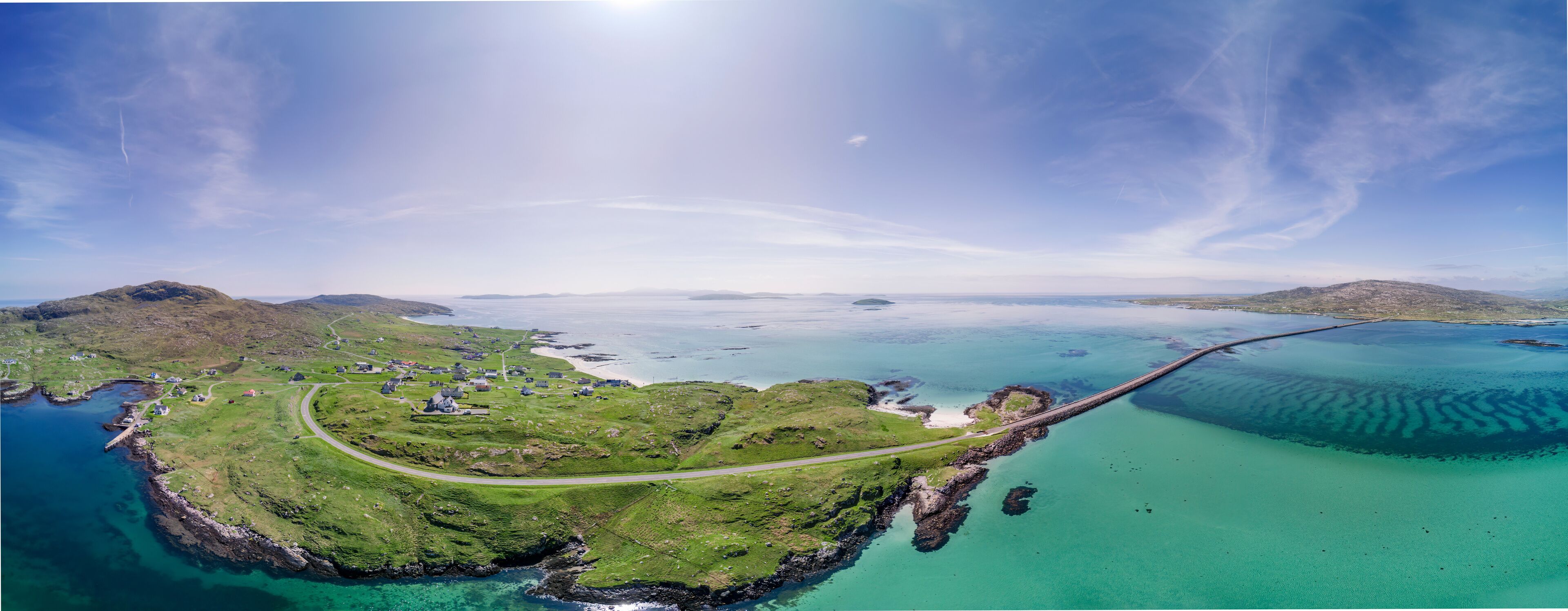 Drone aerial view of the Isle of Eriskay causeway in Scotland's Western Isles, connecting to South Uist.