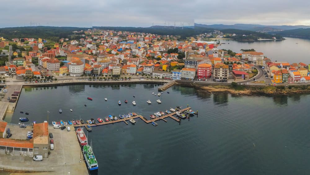Aerial view in Camarinas. Galicia. Coastal town with boats in Spain