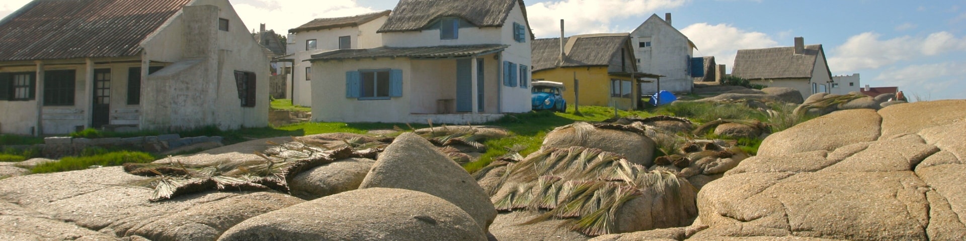 Punta del Diablo featuring a house and a small town or village