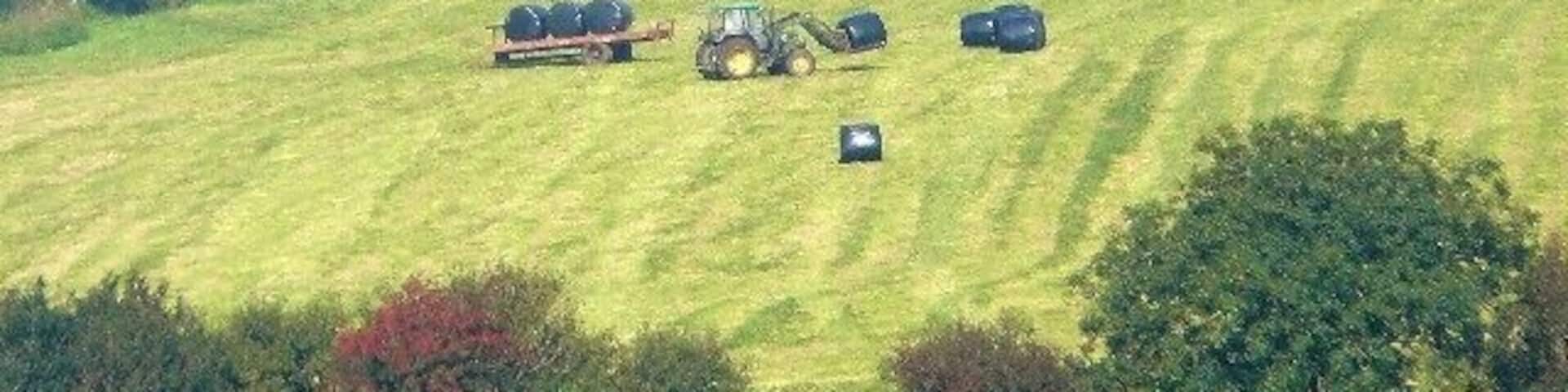 Loading the bales, near to Red Roses, Carmarthenshire/Sir Gaerfyrddin, Wales. The tractor does all the work of loading the bales of silage