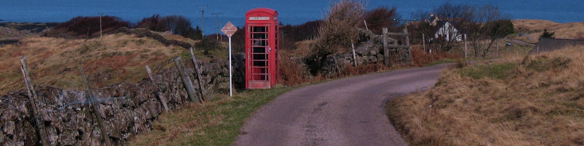 Call home and describe the view Unlikely that the mobile will work here, so the traditional phone box still has its uses. The view is to Rum and Eigg.