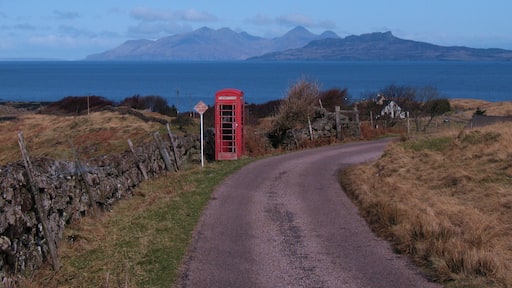 Call home and describe the view Unlikely that the mobile will work here, so the traditional phone box still has its uses. The view is to Rum and Eigg.