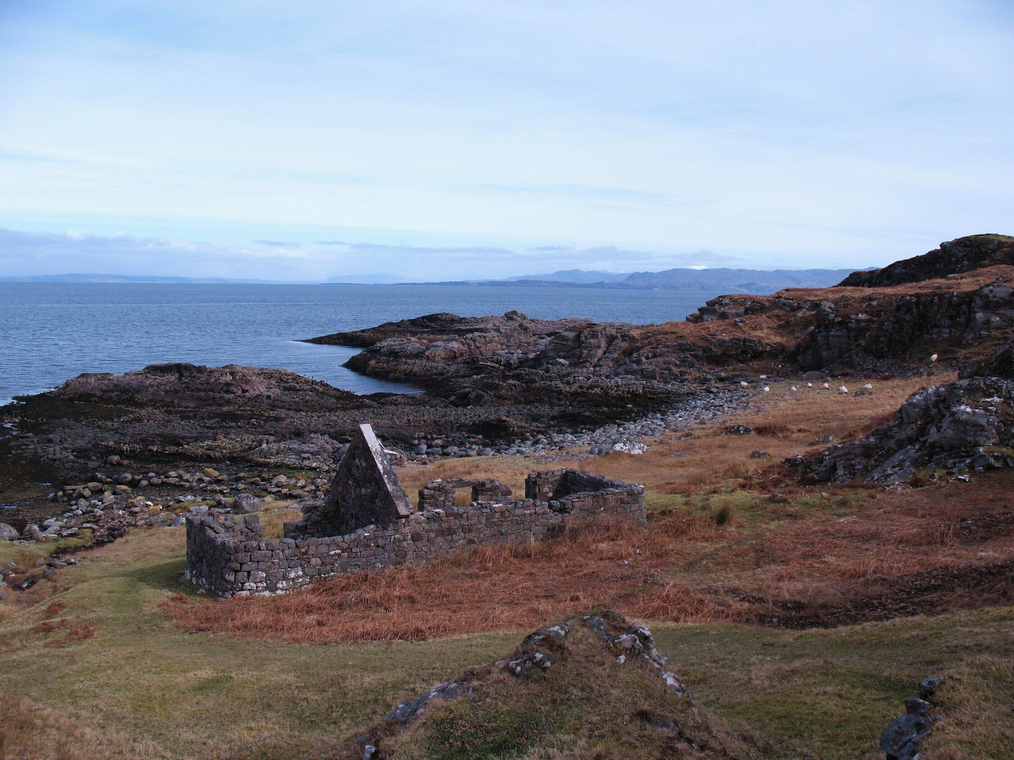 Shoreline ruin near Ockle Ruin on the raised beach at Rubha a Choit. It may well have been an inhabited cottage at one time, but with a stone gable still standing, it wouldn't have been a typical croft or blackhouse.