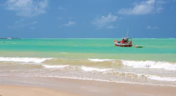 Pajucara Beach showing a sandy beach, boating and general coastal views