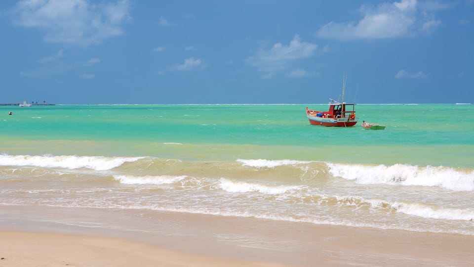 Pajucara Beach showing a sandy beach, boating and general coastal views