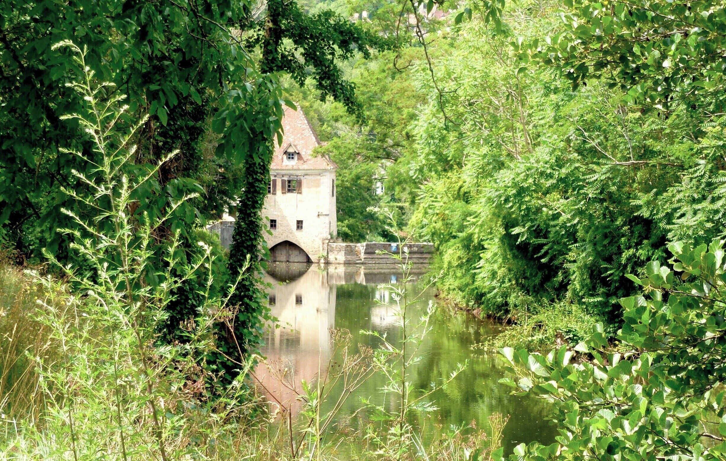 There are many locks on the Lot River but this has to be one of the most picturesque.