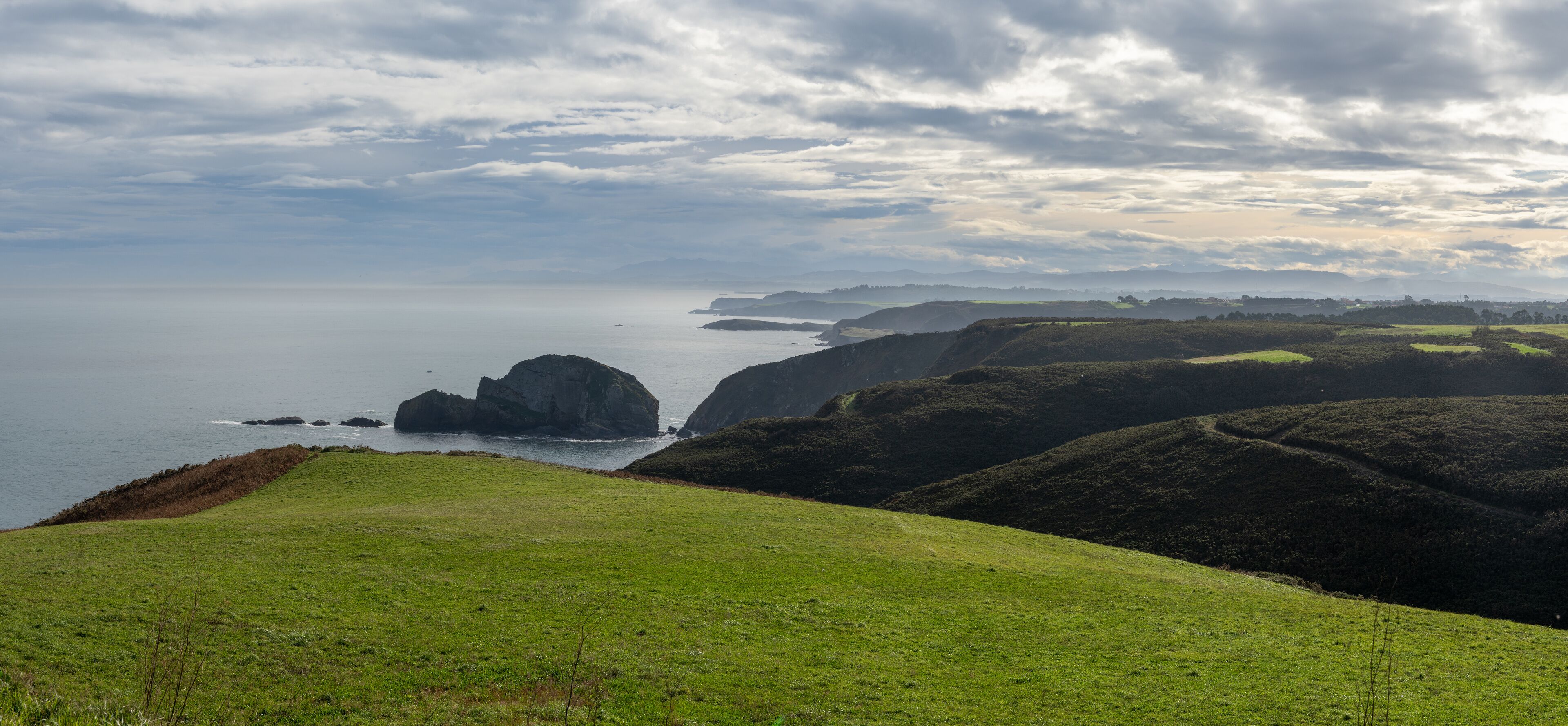 view of the wild and savage coast at the Cabo de Penas in Asturias