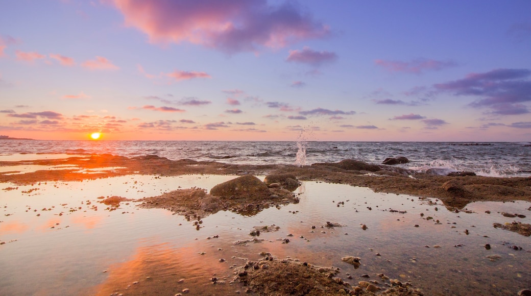 Sunset Atlantic Ocean view at Dar Bouazza rocky beach, in Casablanca south coast.