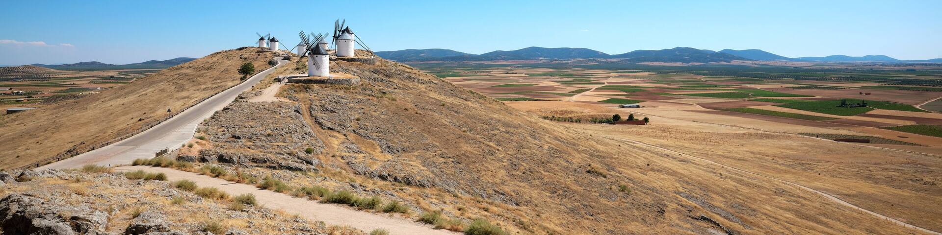 The windmills of Consuegra, located on Colle Calderico, on a sunny day in summer.