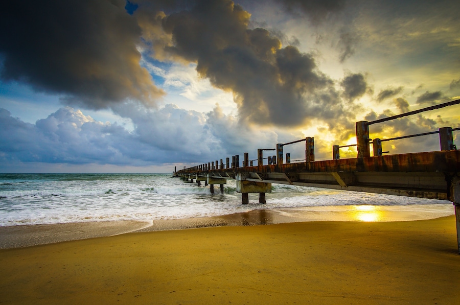 Boardwalk on beach at sunrise . Awana Kijal, Kemaman. Malaysia.
