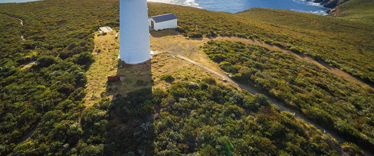 Aerial view of Bruny Island Lighthouse at sunset. Tasmania, Australia