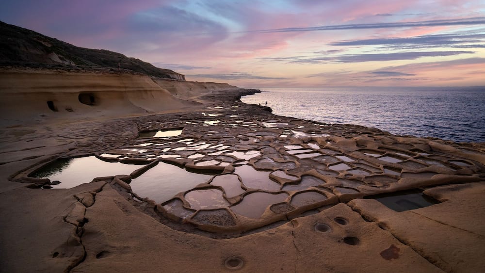 Salt Pans on the island of Gozo in Malta at sunset