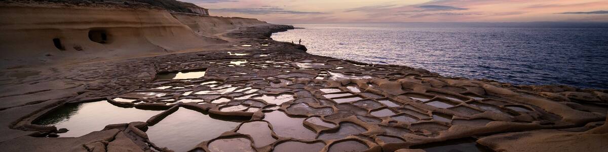 Salt Pans on the island of Gozo in Malta at sunset