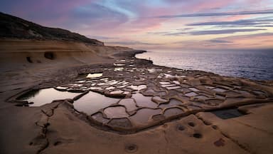 Salt Pans on the island of Gozo in Malta at sunset