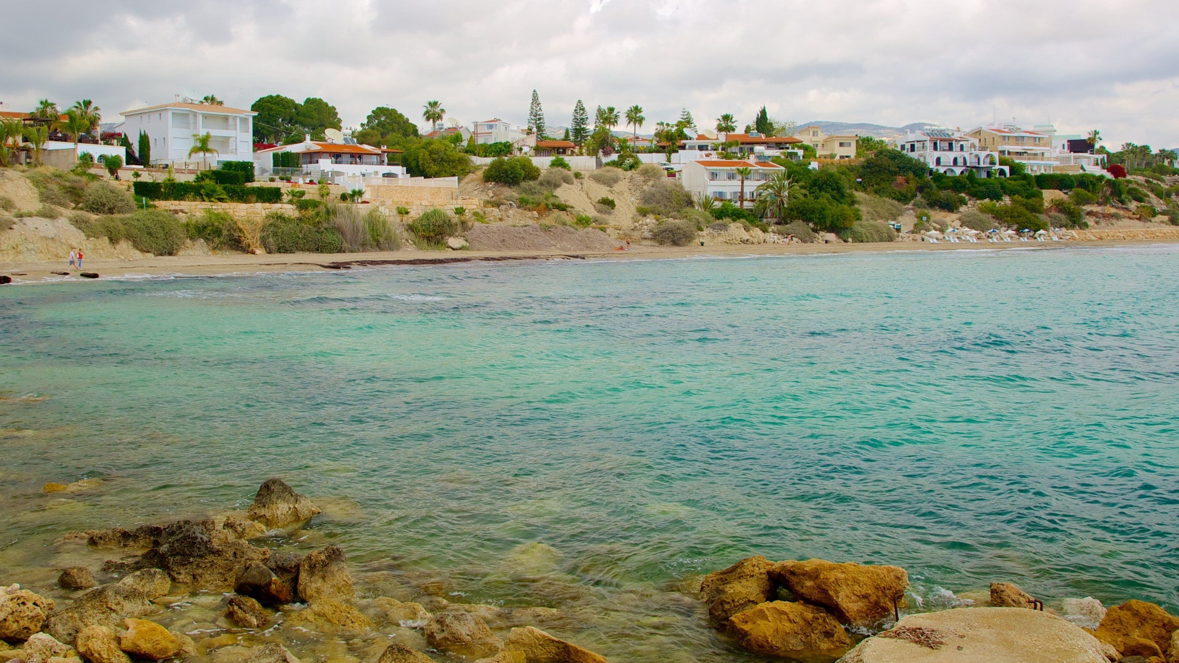 Pegeia showing general coastal views and a coastal town
