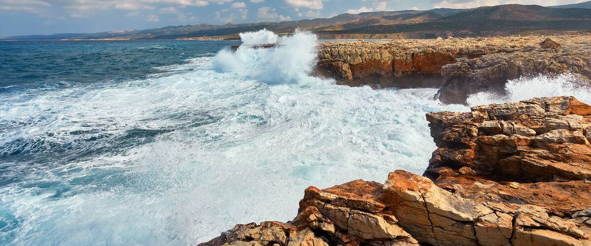 Waves beat on the rocky shore, Mediterranean Sea.