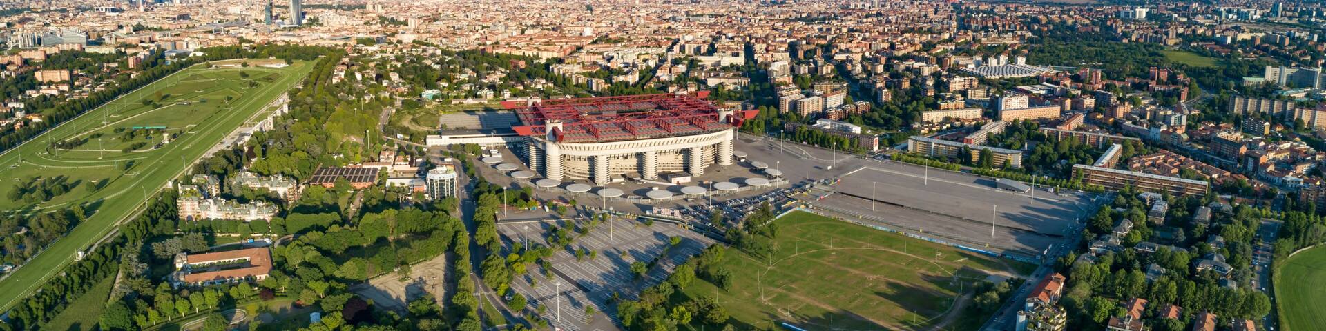 Aerial panoramic view of Milan (Italy) cityscape with the soccer stadium, known as San Siro Stadium
