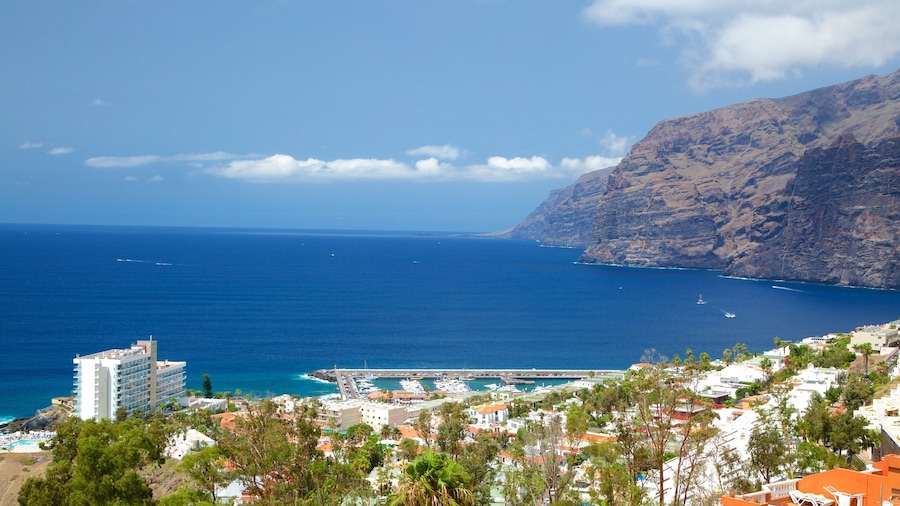 Los Gigantes which includes general coastal views, rocky coastline and a coastal town