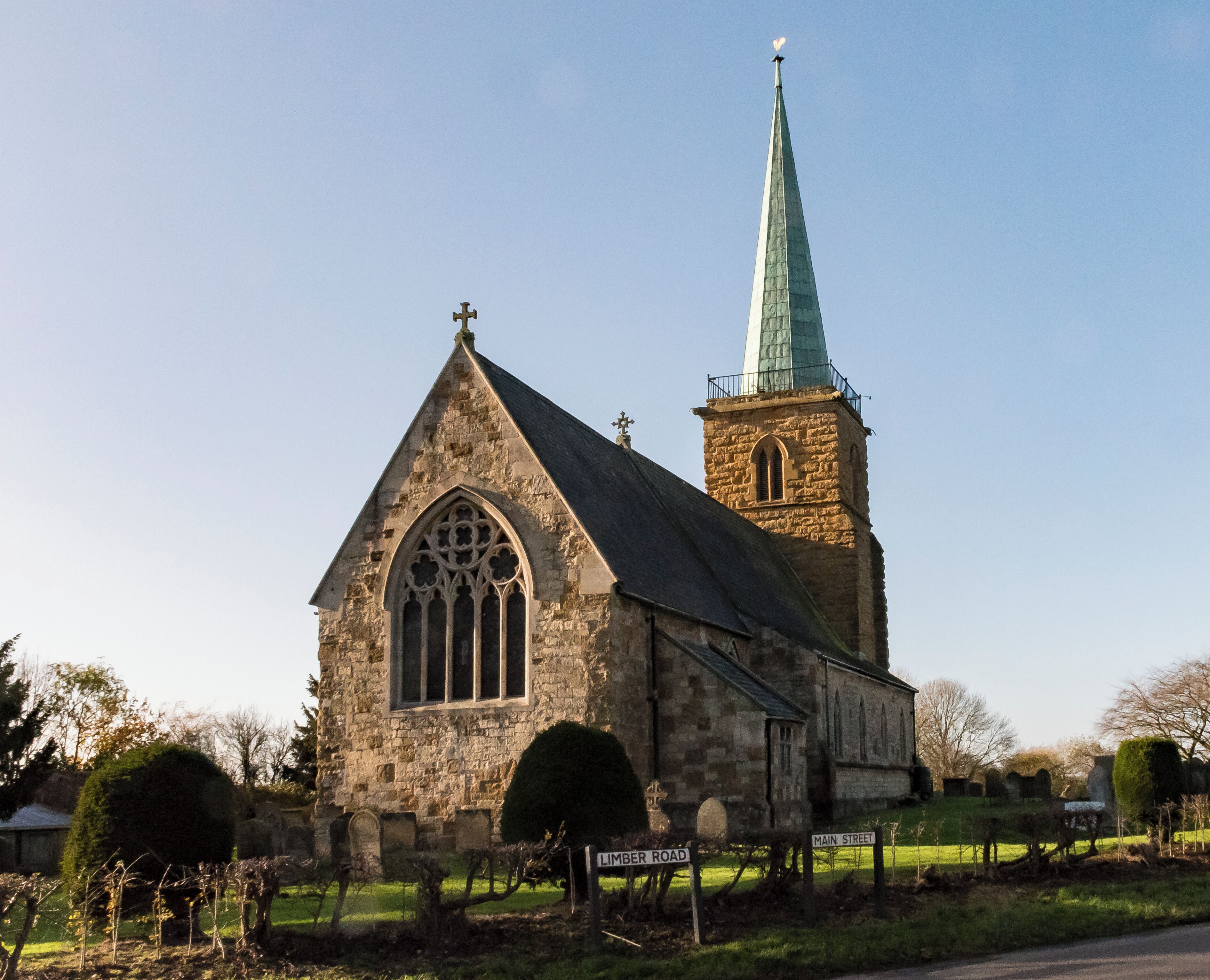 Grade II*listed The church dates from the thirteenth century onwards with restorations and partial rebuilding in the nineteenth century. The church is built in ironstone and ashlar,(which is very weathered on the tower), as well as limestone and a slate roof. There is a western tower, four bay nave with north and south aisles, chancel, and vestry. The tower is of three stages and dates from the thirteenth century. At the top there are parapet railings and a hexagonal copper-covered spire which was added in 1838. The north arcade dates from the early fourteenth century, and has quatrefoil piers with carved capitals. The south arcade has octagonal piers with plain capitals and is from the late fourteenth century. The chancel was partially rebuilt in 1860 by S. S. Teulon. There is a two manual organ dating from 1889. The church has several stained glass windows, including a memorial to 166 Squadron of the RAF.