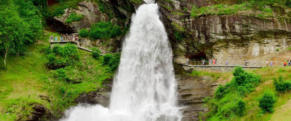 Norheimsund which includes a waterfall and a bridge as well as a small group of people