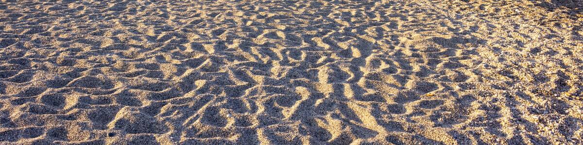 View of the sandy beach on a sunny morning. Turkey. Mahmutlar.Kargicak.