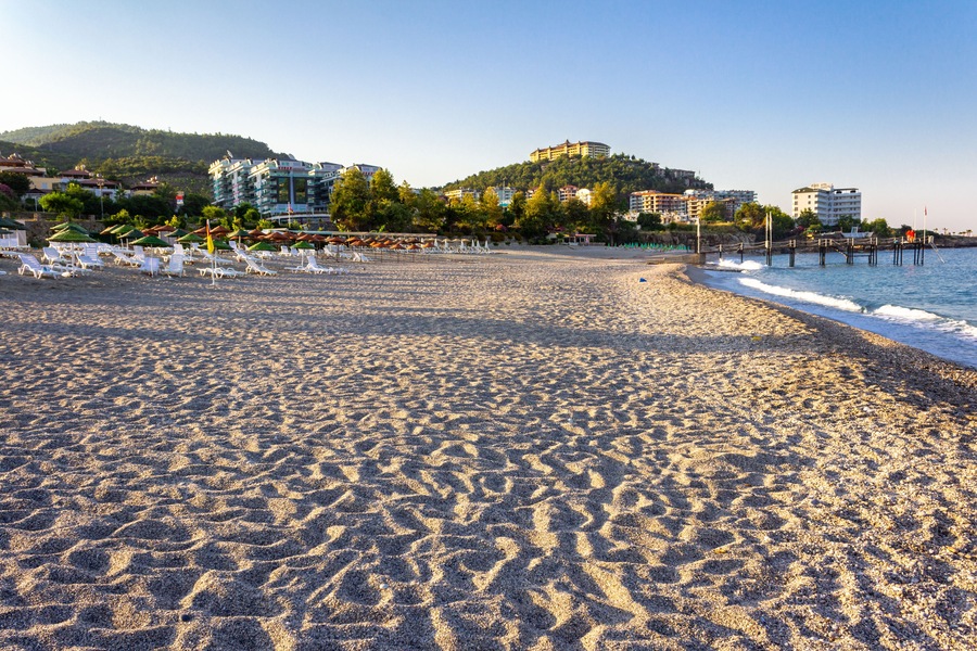 View of the sandy beach on a sunny morning. Turkey. Mahmutlar.Kargicak.