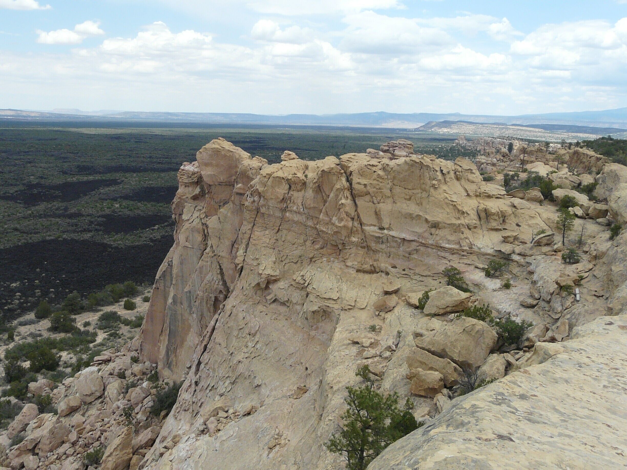 This is a wonderful overlook at Sandstone Bluffs overlooking the lava flows at El Malpais about 12 miles south of Grants, NM.  It's an easy stop off of the Interstate but worth driving through the park.  The Ventana Arch is about 8 miles further down Highway 117.