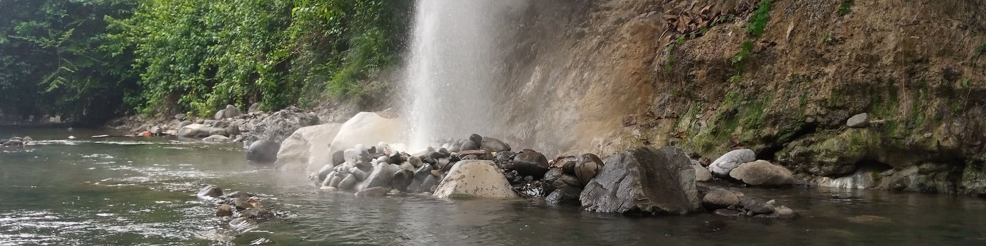 Summer in Indonesia. Panorama of Hot Springs (Geysers) in the river in Cisolok - Sukabumi.