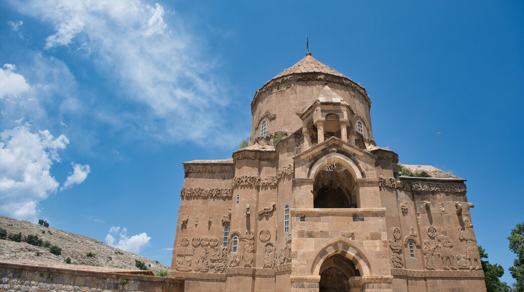 View of Cathedral of the Holy Cross, Aghtamar known in Turkish as 'Akdamar Adası Kilisesi' and blue sky in 06.13.2022, Edremit, Van,Turkey