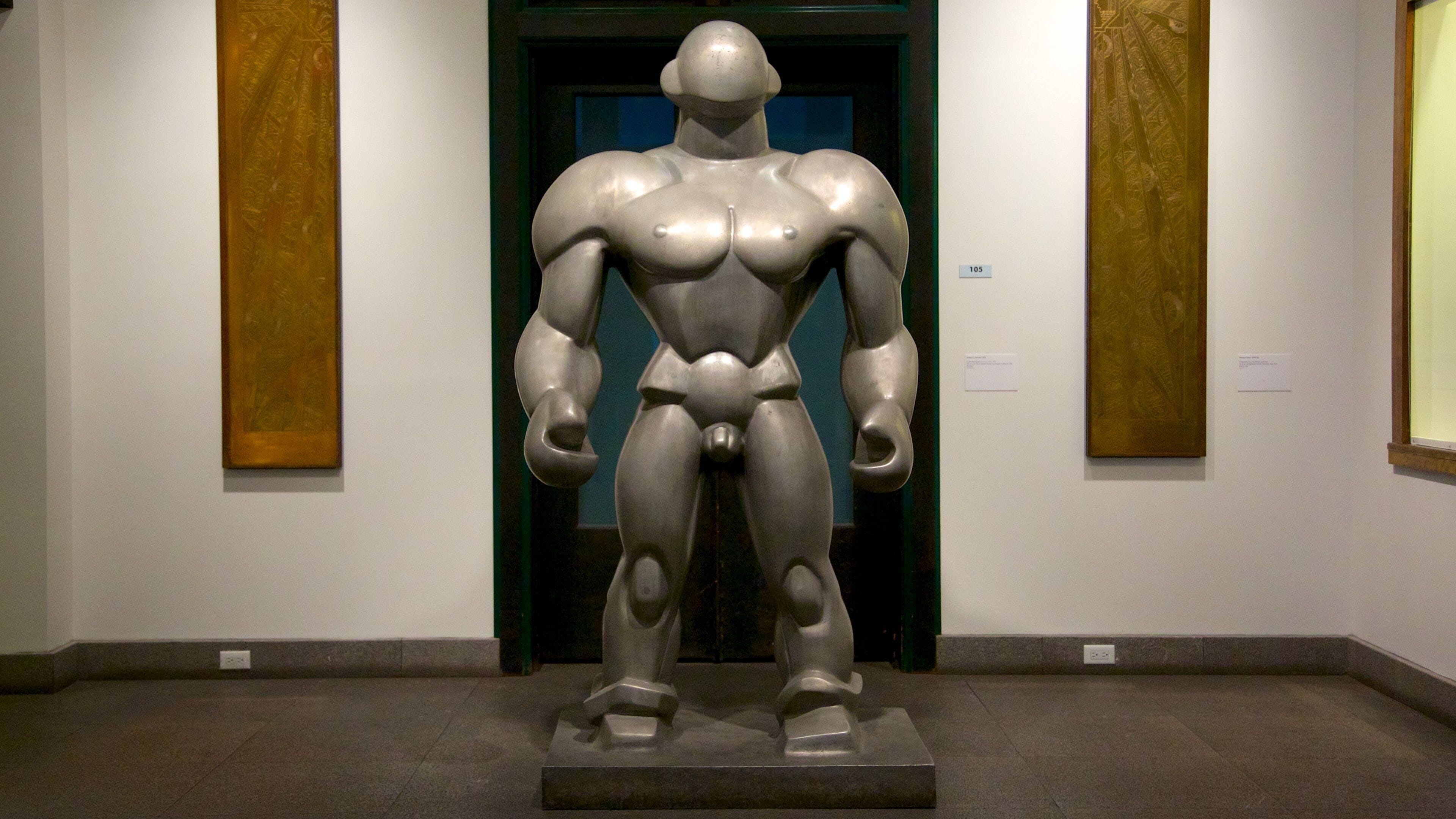 The Wolfsonian Museum showing a statue or sculpture and interior views