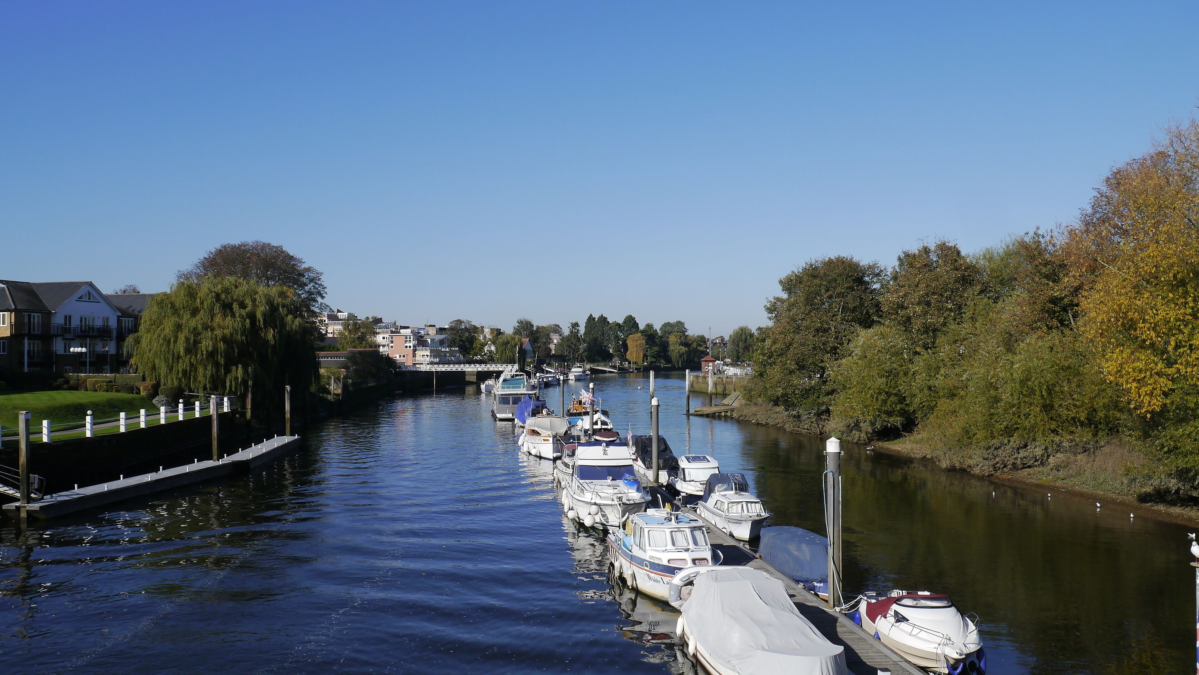 Boats Moored up on the River Thames in Teddington London Uk