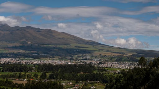 Panoramic photo of the city of Machachi with the background of the volcano heart in Ecuador