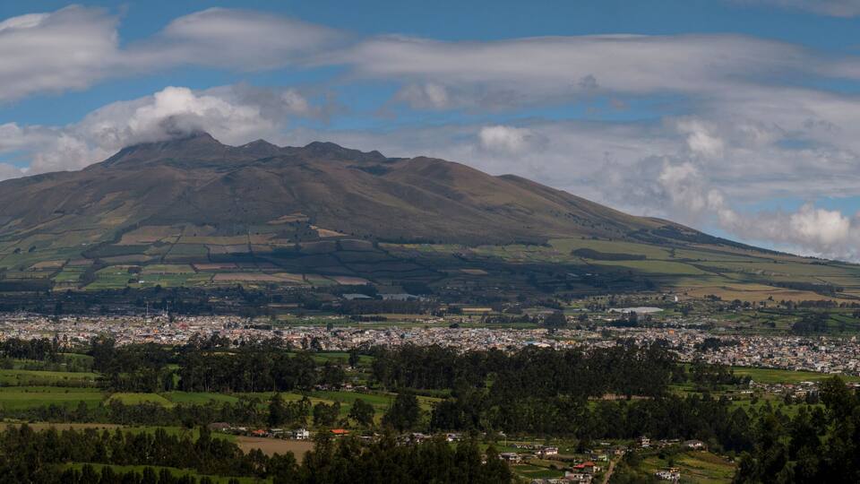 A mountain with a town at its base.