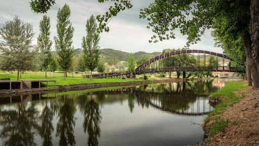 Pedestrian bridge and its reflection, on the Sert√£ river, in Sert√£, Portugal - Ponte pedonal e seu reflexo, sobre a ribeira da Sert√£, na Sert√£, em Portugal