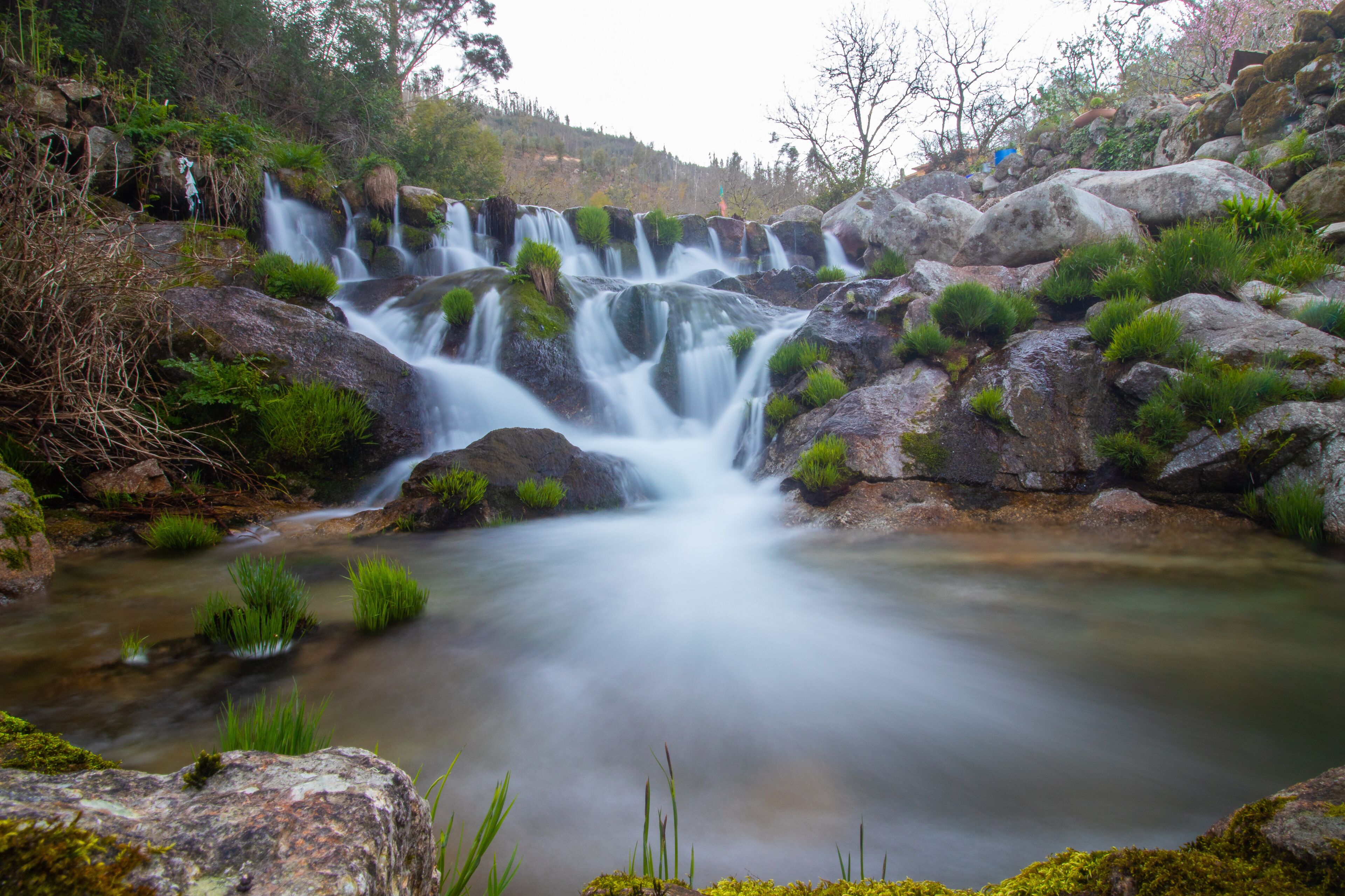 small waterfall in castelões river in Tondela, Portugal