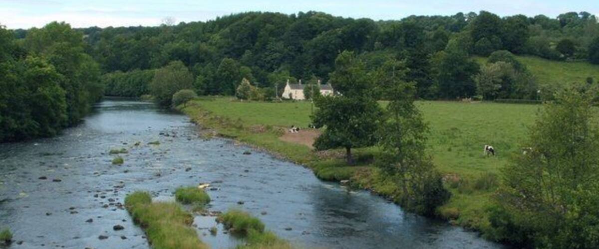 River Clyde at Crossford. This is a similar view to 119818, and it was taken from the same place, but it shows the other bank of the river. The building in the distance is Holmfoot House.