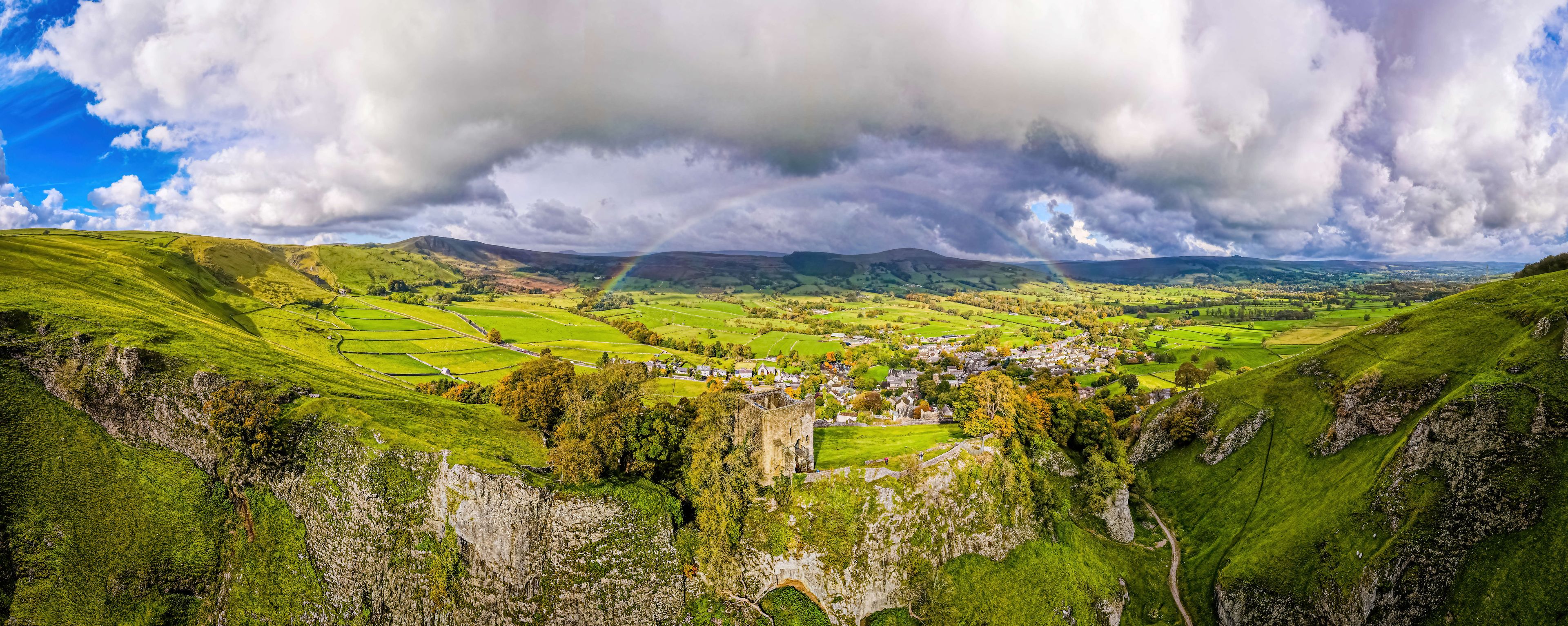 Aerial view of Peveril Castle ruins in Castleton in Peak District, England, UK