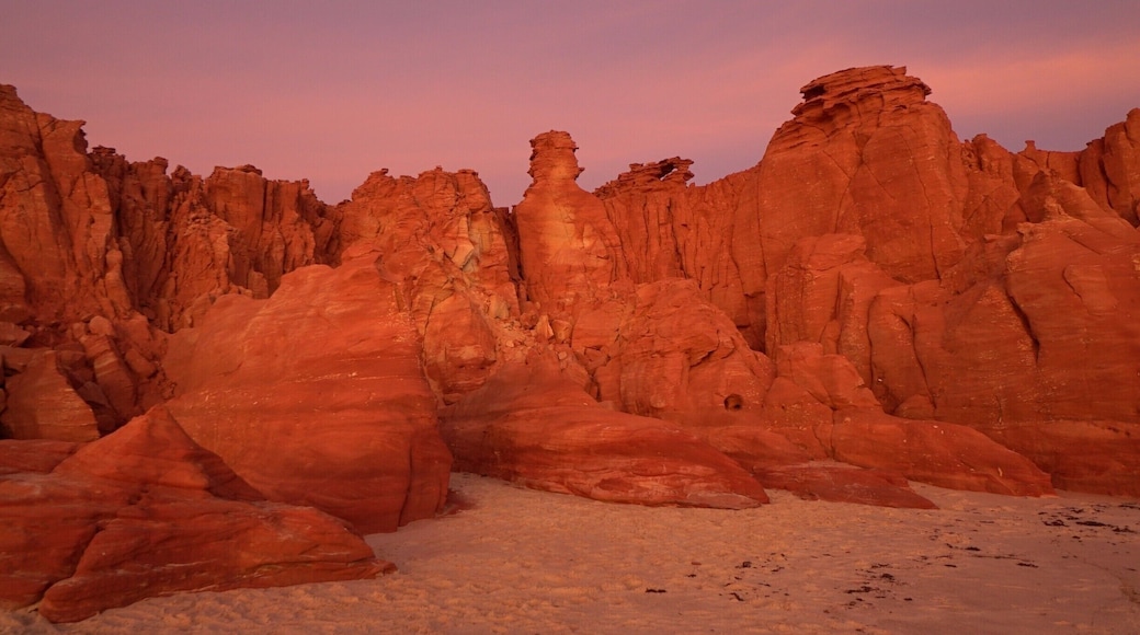 Cape Leveque is the northernmost tip of the Dampier Peninsula in the Kimberley region of Western Australia. Cape Leveque is 240 kilometres (150 mi) (via the Cape Leveque Road) north of Broome, and is remote with few facilities. Nevertheless, the Cape's sandy beaches and red cliffs are attracting an increasing number of visitors.
#sunset
#BeachBound