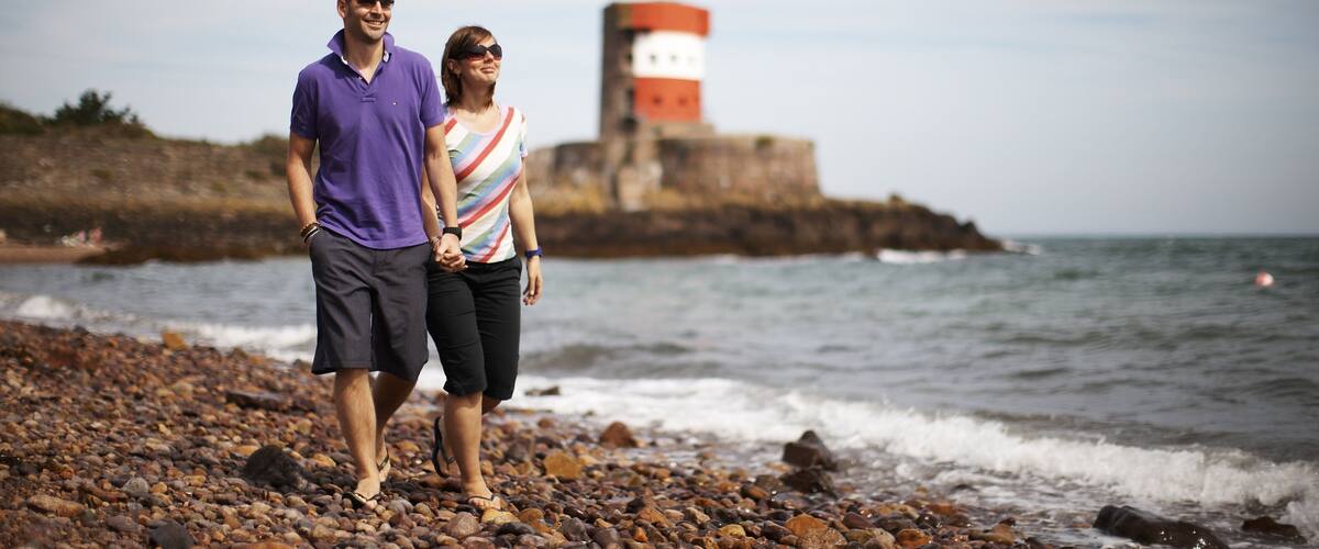 St Martin\'s featuring a pebble beach as well as a couple