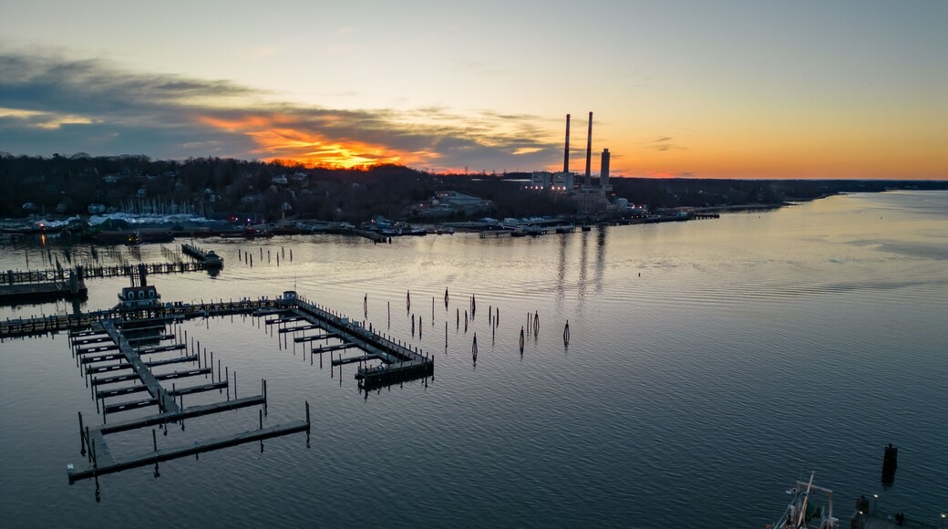Aerial view of the Port Jefferson Harbor during a beautiful and cloudless sunset in the winter