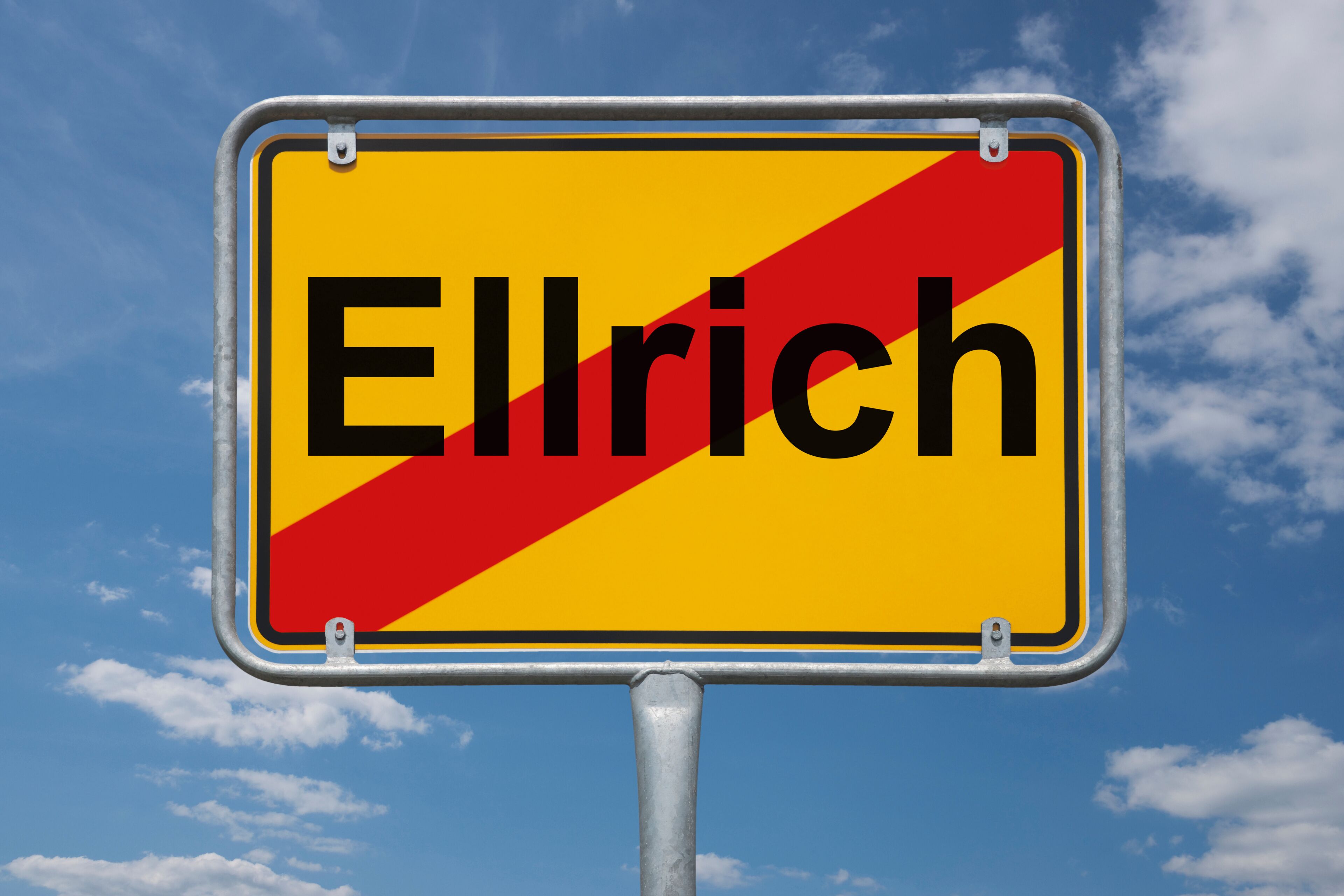 A road sign with the name "Ellrich" on a yellow background with a red diagonal stripe.