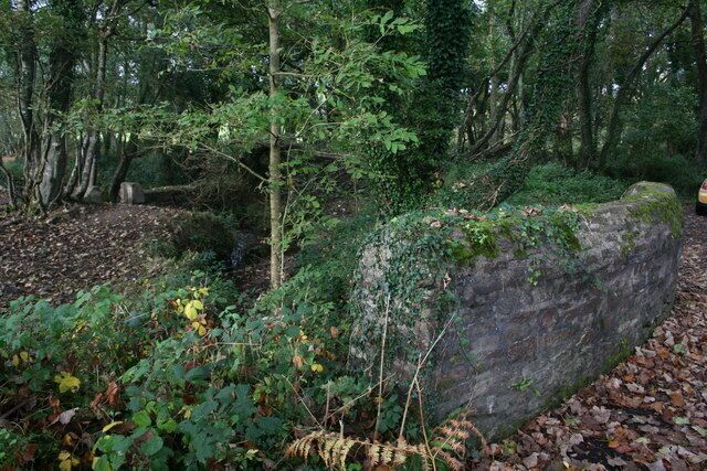 Little bridge The westward parapet of the little road bridge over Gilbert's water, which reaches the sea at Mawgan Porth.