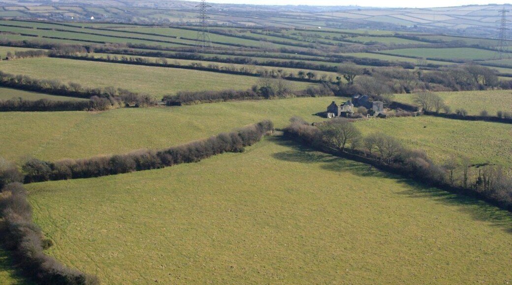 The View from Delabole Waste Tip The quarry waste tip does not rise above the level of the land at Delabole but as it juts out into valley below there is a very steep drop onto farmland to the southeast.